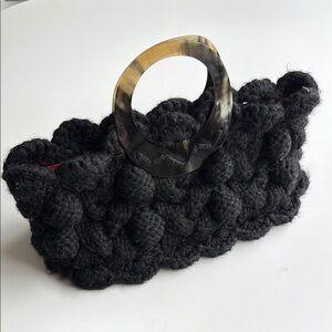 Cableknit crochet purse by Meche Correa for e bella chunky knit bag
